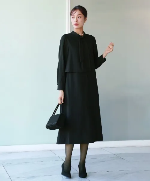 ワンピース 「洗濯機で洗える」喪服/アシンメトリーボウタイデザインブラックフォーマルワンピース（裏付き）