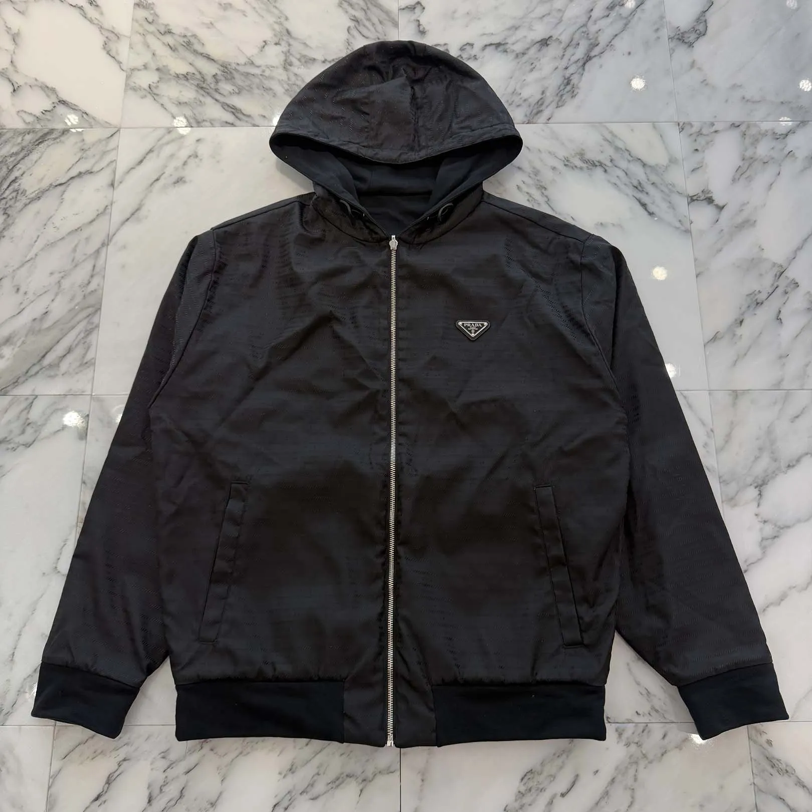 PRADA 2022SS Triangle Logo Plate Reversible Jacket UJL28A S222 11B9 Size S プラダ トライアングルロゴプレート リバーシブルジャケット ジップパーカー トライアングルロゴプレート 刻印金具 総柄 ブラック×シルバー サイズS【260314】【中古-A】