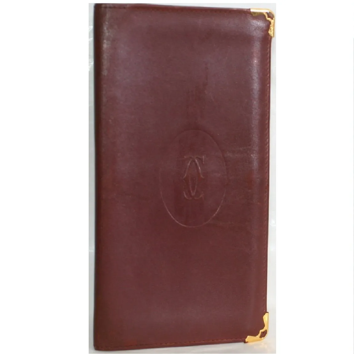【中古】本物綺麗カルティエの紳士用ボルドーカーフ色収納ポケットの多い長財布 サイズW9,5H18,8cm 〇C10-521-3